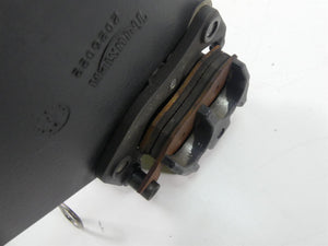 2002 Triumph Bonneville America Rear Brake Caliper & Mount Bracket T2023030 | Mototech271