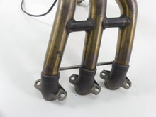 Load image into Gallery viewer, 2013 Triumph Street Triple 675R Nice Exhaust Pipe Header Manifold T2202030 | Mototech271
