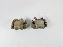 Load image into Gallery viewer, 2011 Can-Am Outlander 650 4X4 XT Front Brake Caliper Set 705600576 705600575
