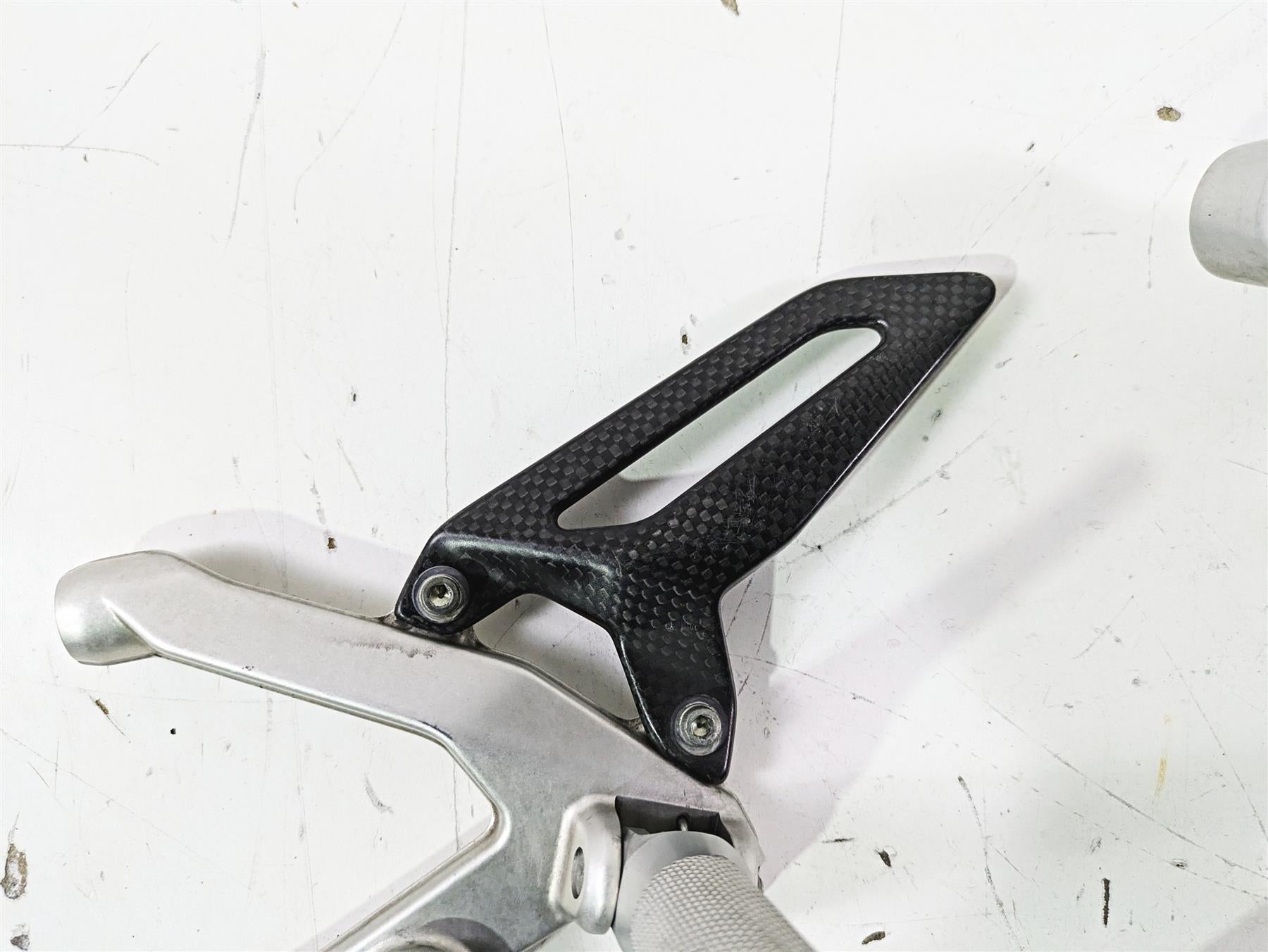 2015 Ducati Panigale 1299 S Left Footpeg & Frame Holder 8291E061AA 82424631AA {{ shop.shopifyCountryName }} - Mototech271