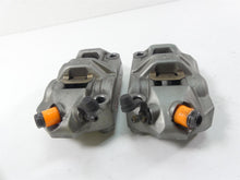 Load image into Gallery viewer, 2011 Ducati Hypermotard 1100 SP Front Brembo Brake Calipers 61040901A 61040911A
