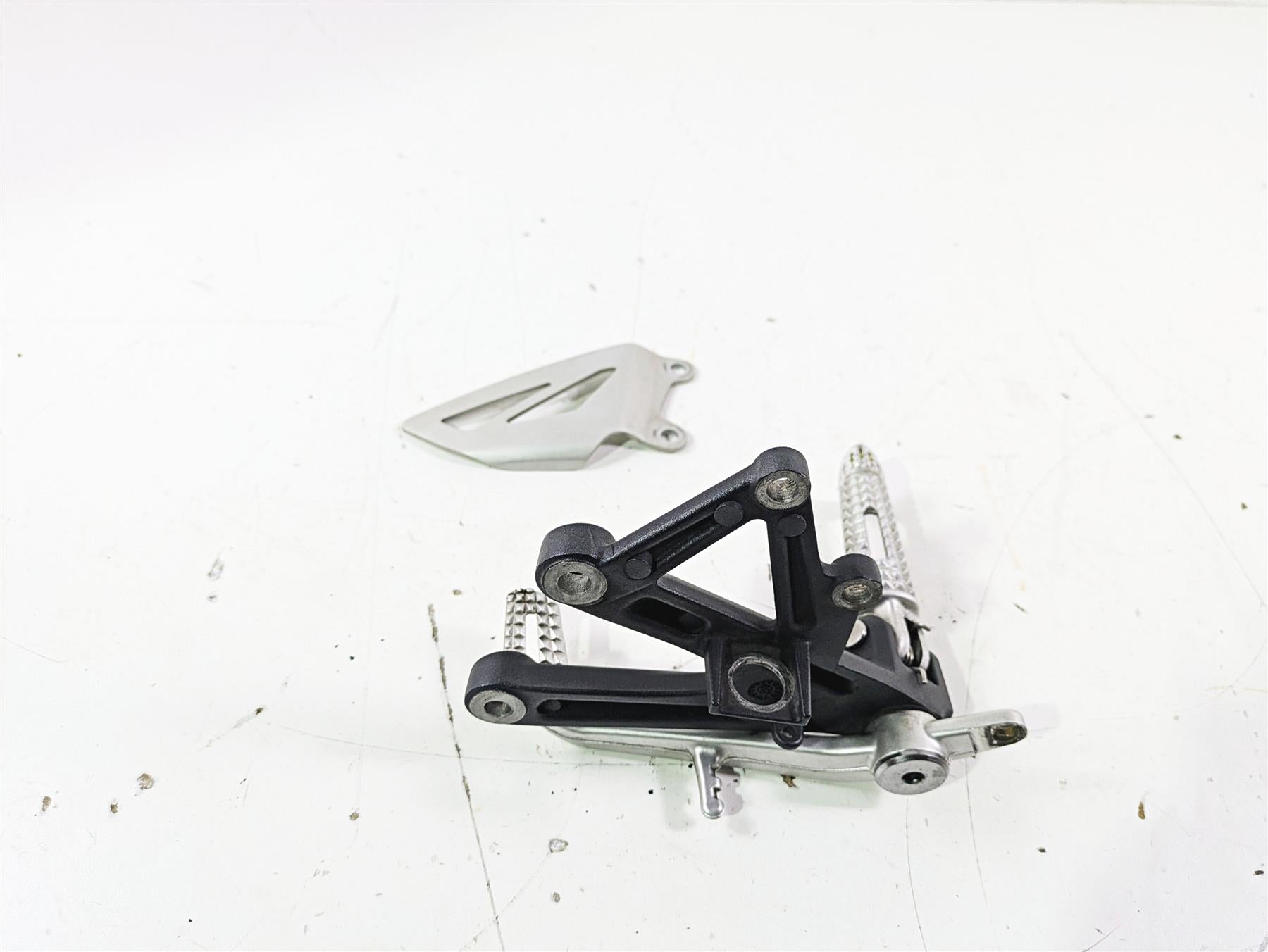 2012 Triumph Daytona 675 Right Rider Footpeg & Brake Pedal Set T2082056 T2082056 {{ shop.shopifyCountryName }} - Mototech271