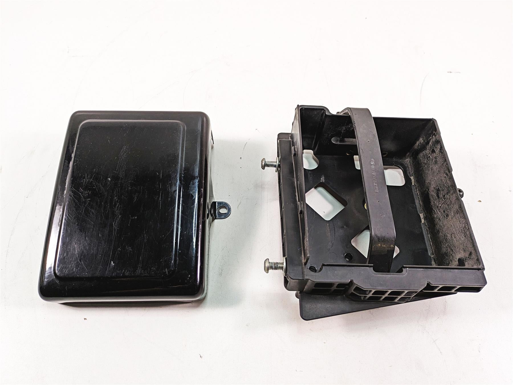 2012 Harley FLD Dyna Switchback Battery Tray Carrier Stay & Cover 70379-06B {{ shop.shopifyCountryName }} - Mototech271