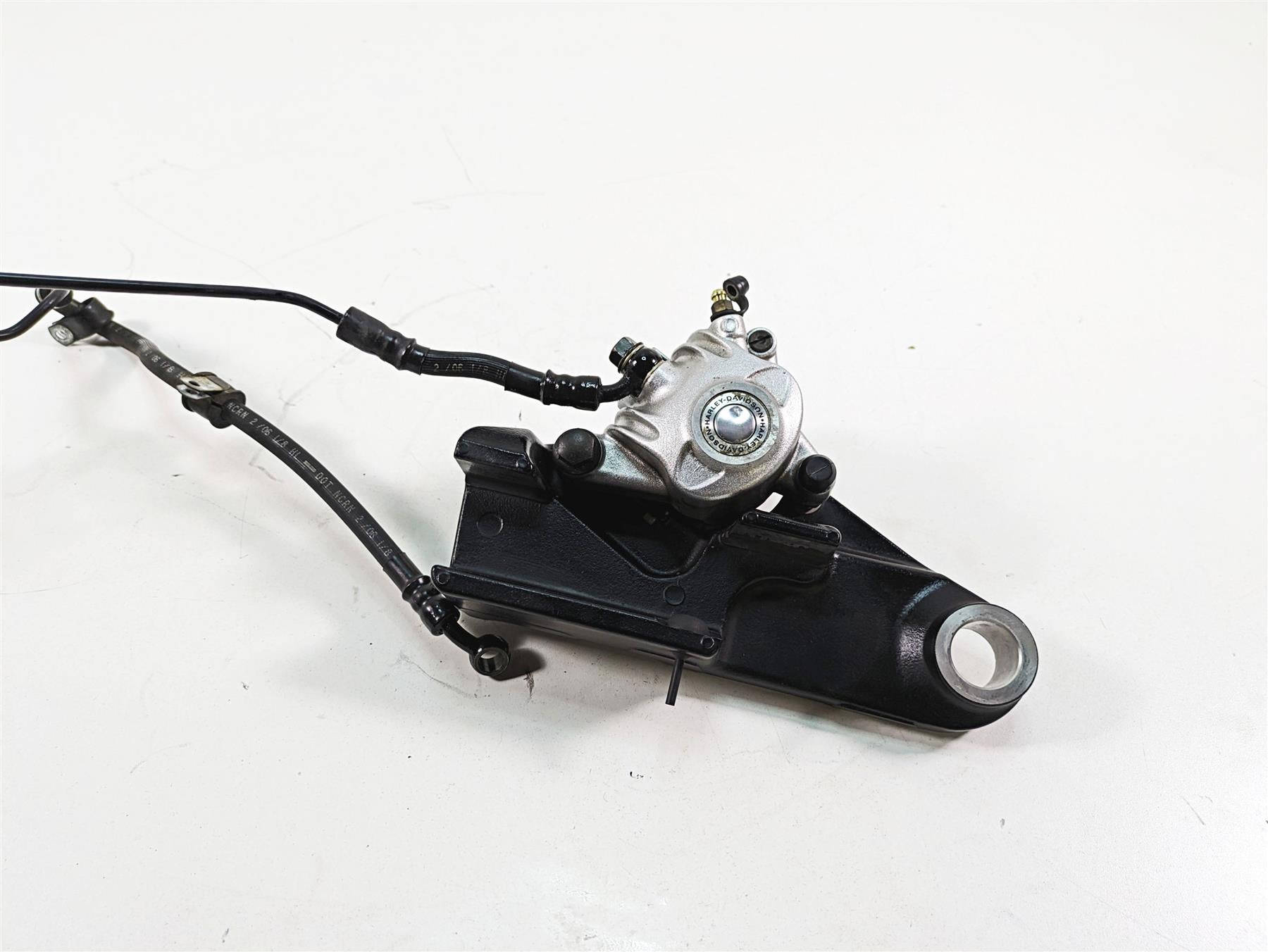 2006 Harley Sportster XL1200 Rear Brake Caliper + Bracket & Line 40968-05A {{ shop.shopifyCountryName }} - Mototech271