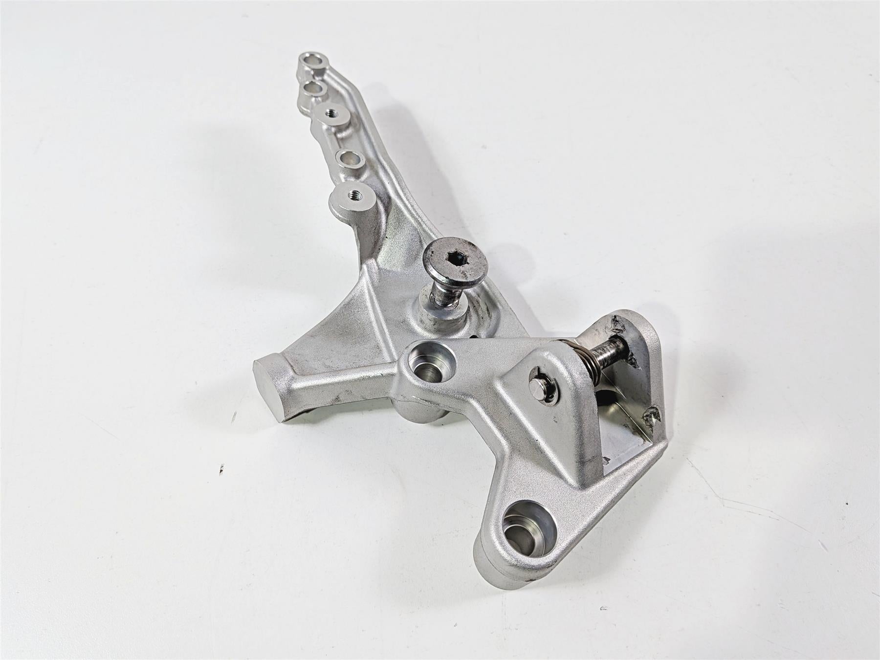 2022 Triumph Tiger 900 GT Pro Right Front Foot Peg Mount T2082358 {{ shop.shopifyCountryName }} - Mototech271