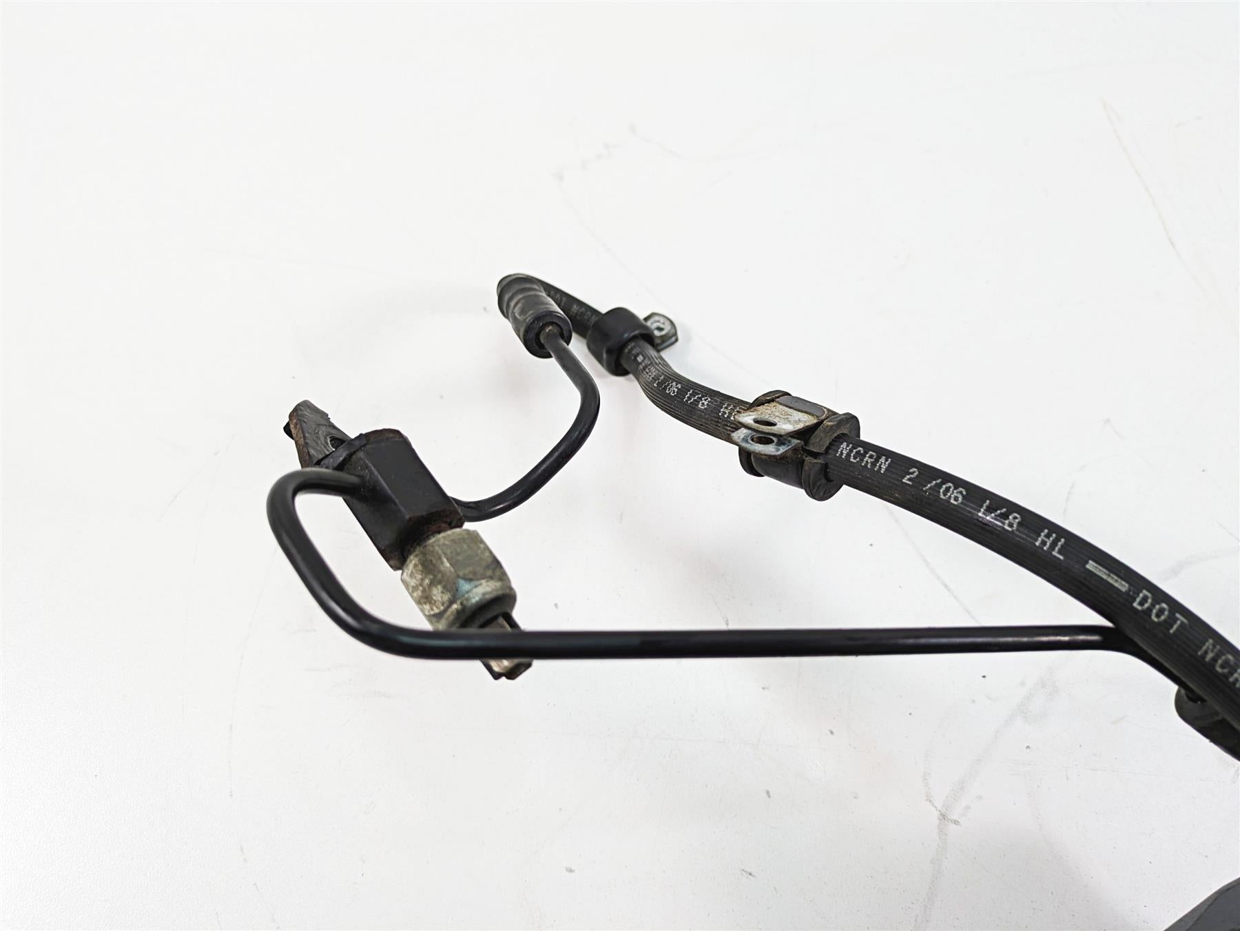 2006 Harley Sportster XL1200 Rear Brake Caliper + Bracket & Line 40968-05A {{ shop.shopifyCountryName }} - Mototech271