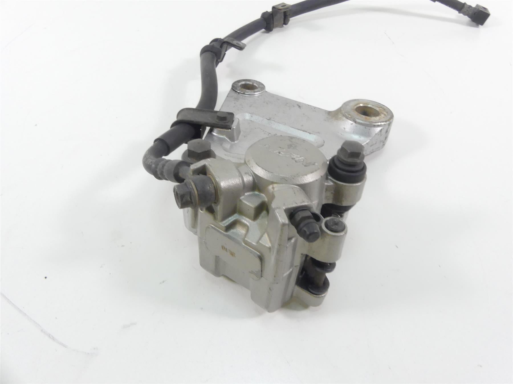 2003 Honda VTX1300 S Rear Nissin Brake Caliper + Bracket & Line 43150-MEA-671 {{ shop.shopifyCountryName }} - Mototech271