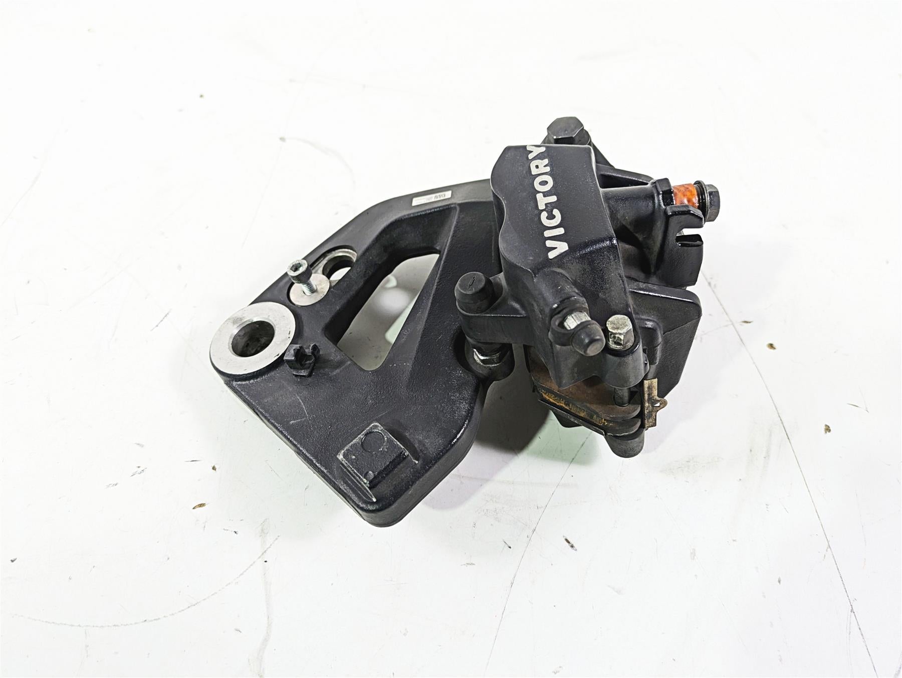 2012 Victory Cross Country Rear Brake Caliper & Bracket 1911748 1911949 {{ shop.shopifyCountryName }} - Mototech271