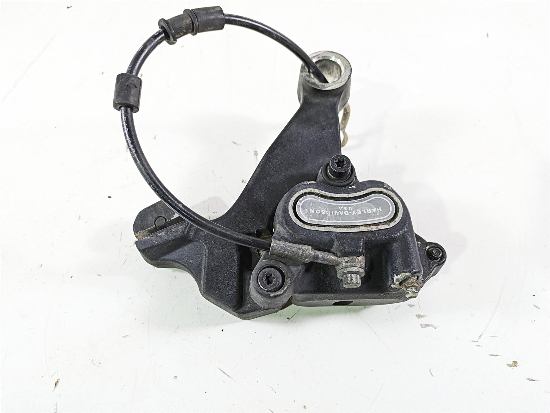 2012 Harley FLD Dyna Switchback Rear Brake Caliper & Bracket 40908-08 {{ shop.shopifyCountryName }} - Mototech271