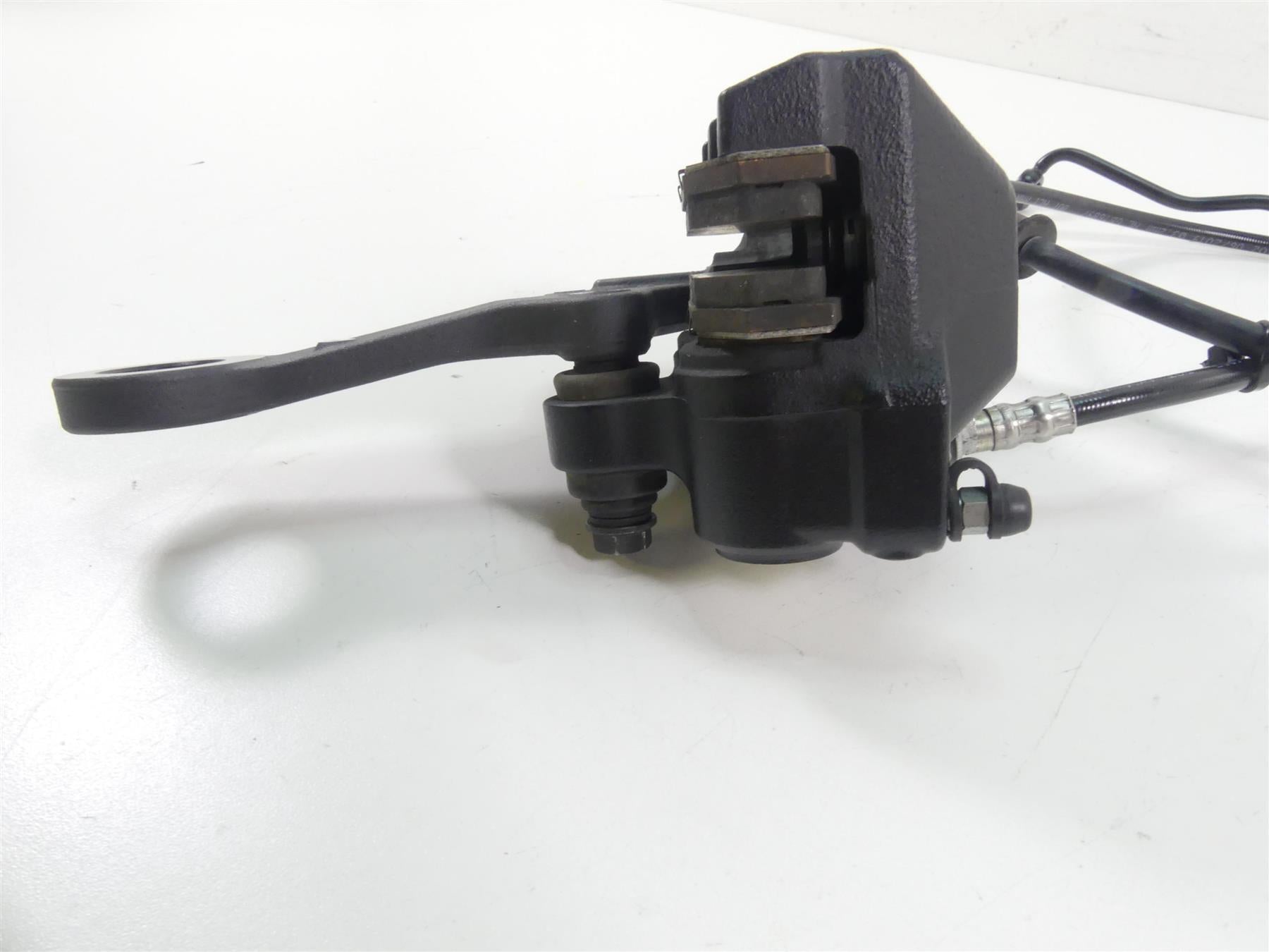 2020 Harley Softail FXBB Street Bob Rear Brake Caliper + Line & Bracket 41300192 {{ shop.shopifyCountryName }} - Mototech271