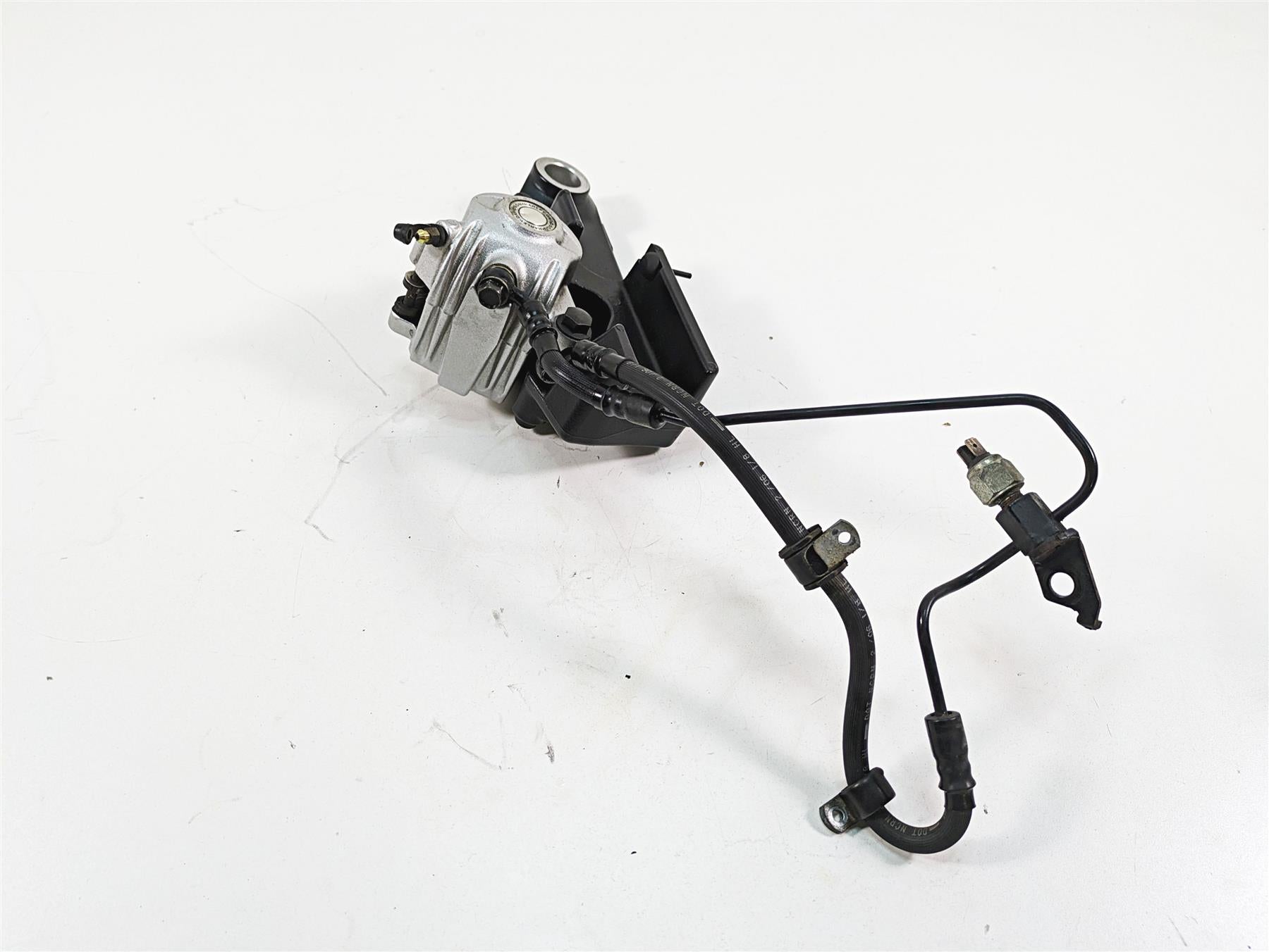2006 Harley Sportster XL1200 Rear Brake Caliper + Bracket & Line 40968-05A {{ shop.shopifyCountryName }} - Mototech271