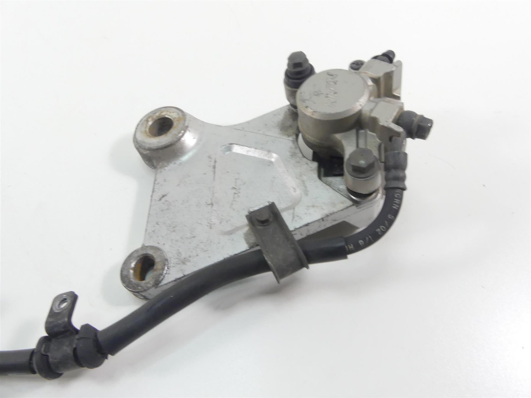 2003 Honda VTX1300 S Rear Nissin Brake Caliper + Bracket & Line 43150-MEA-671 {{ shop.shopifyCountryName }} - Mototech271