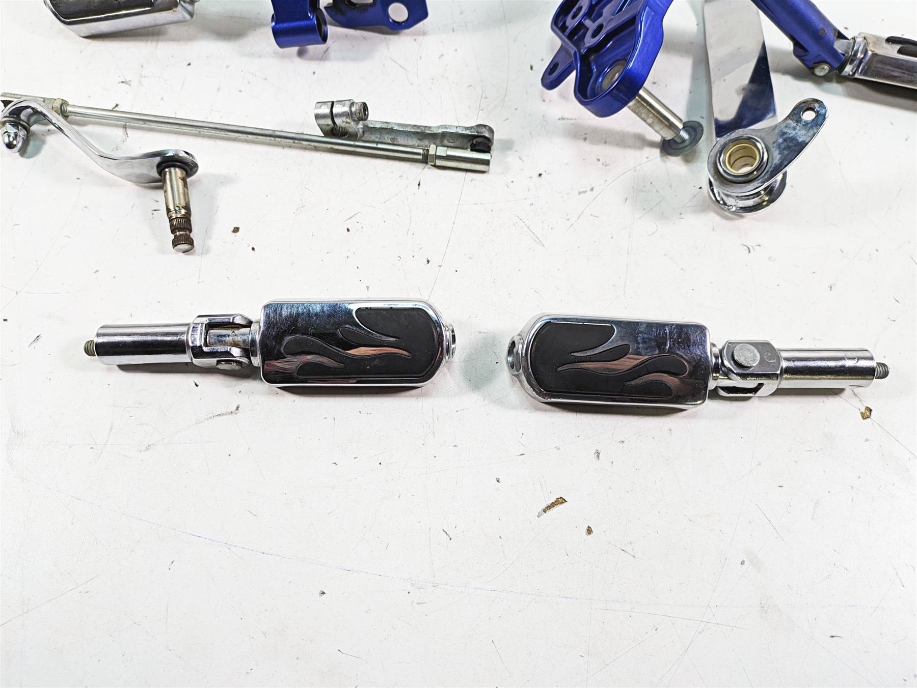 2009 Harley FXCWC Softail Rocker C Flame Foot Peg & Blue Brackets Set 33683-07A {{ shop.shopifyCountryName }} - Mototech271