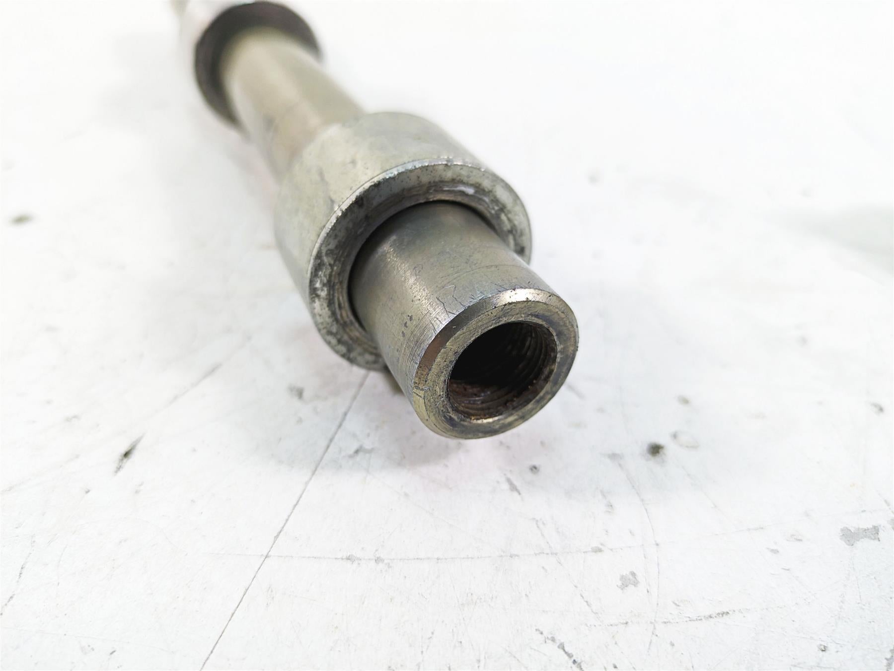 2009 Harley FXCWC Softail Rocker C Front Axle Wheel Spindle 25mm 41348-08 {{ shop.shopifyCountryName }} - Mototech271