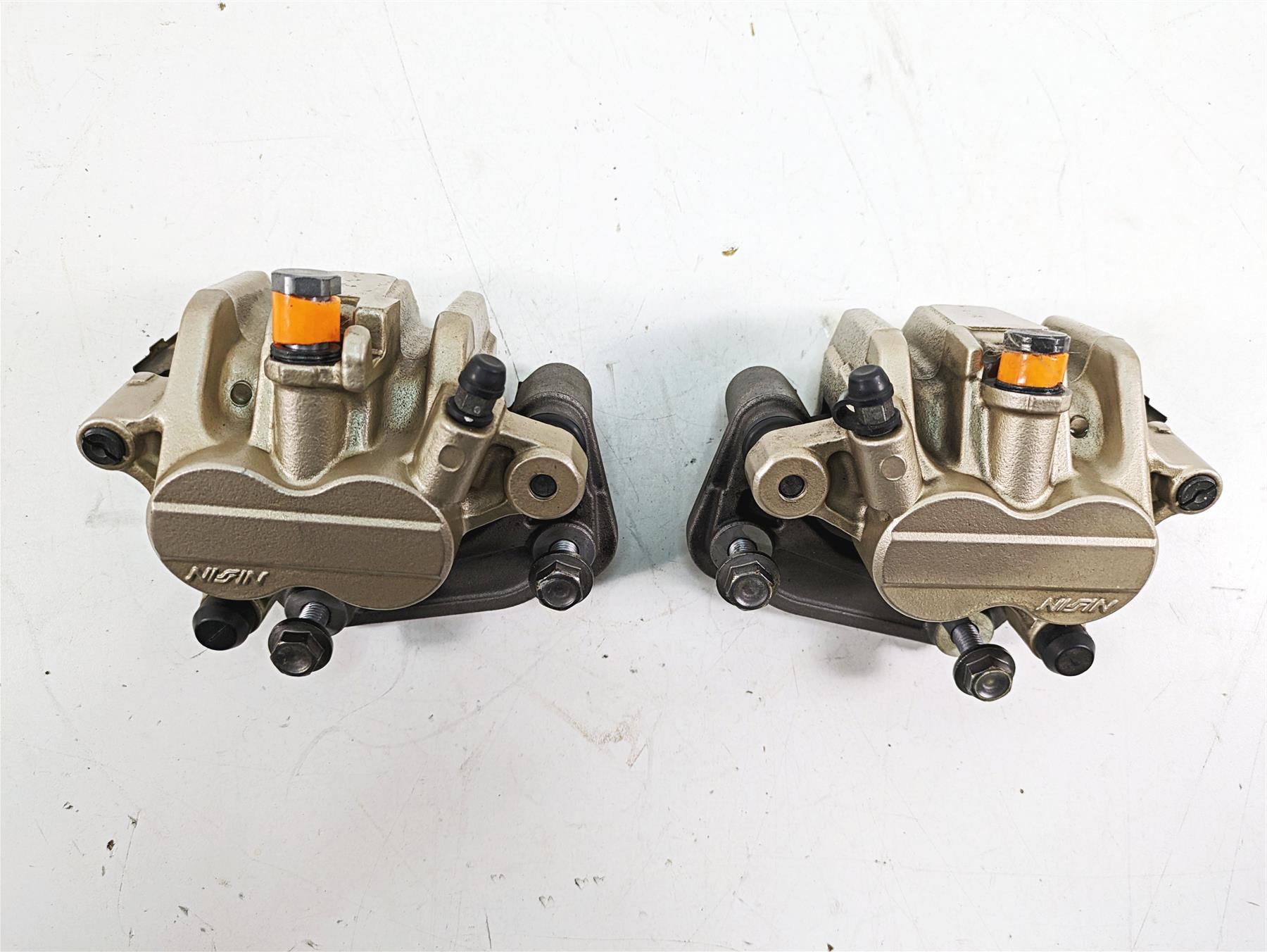 2012 Triumph Tiger 800XC ABS Nissin Front Brake Caliper Set T2022030 T2022031 {{ shop.shopifyCountryName }} - Mototech271