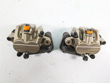Load image into Gallery viewer, 2012 Triumph Tiger 800XC ABS Nissin Front Brake Caliper Set T2022030 T2022031
