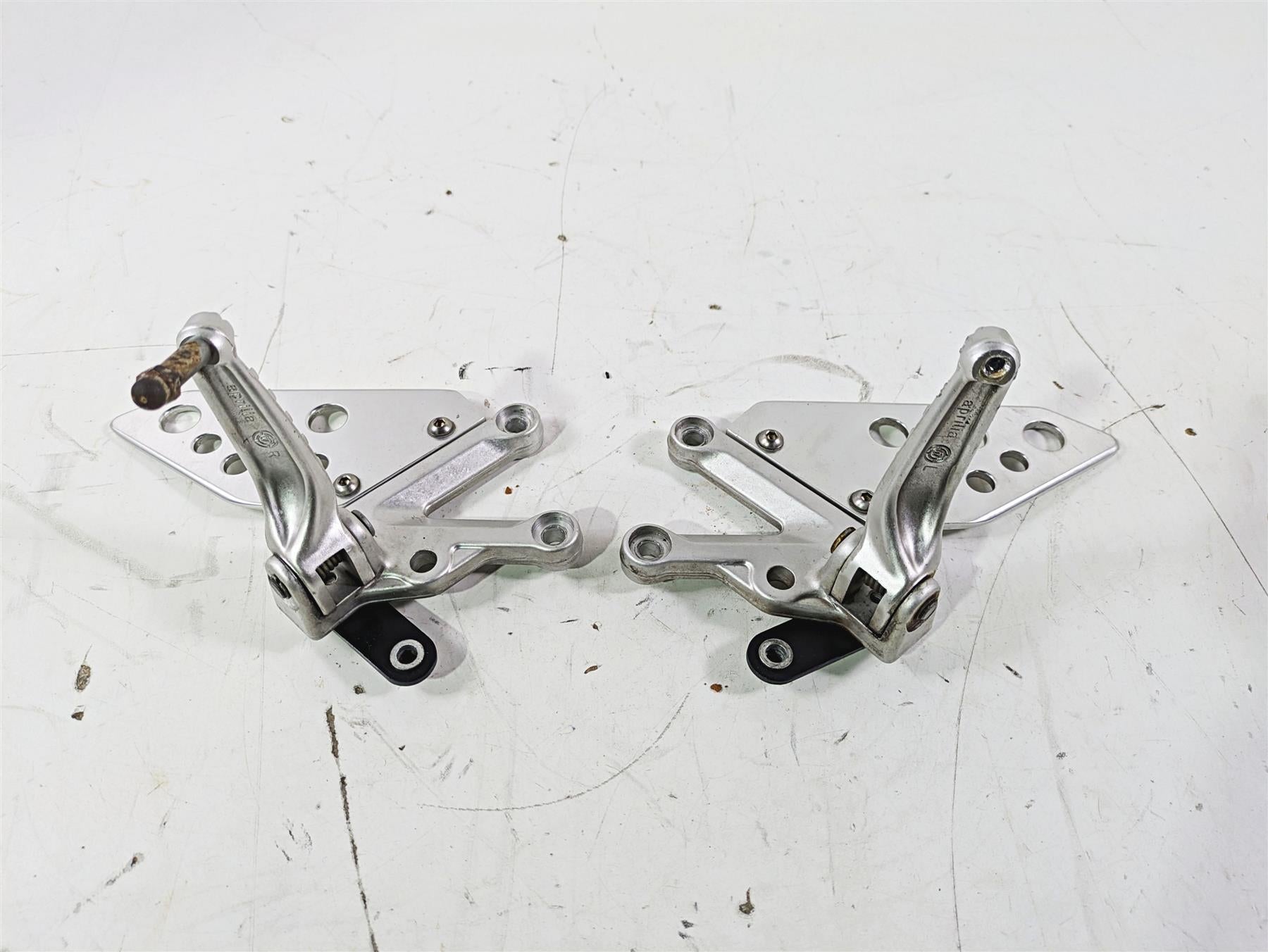 2008 Aprilia RSVR 1000 Factory Front Left Right Foot Peg Set AP8154069 AP8154070 {{ shop.shopifyCountryName }} - Mototech271