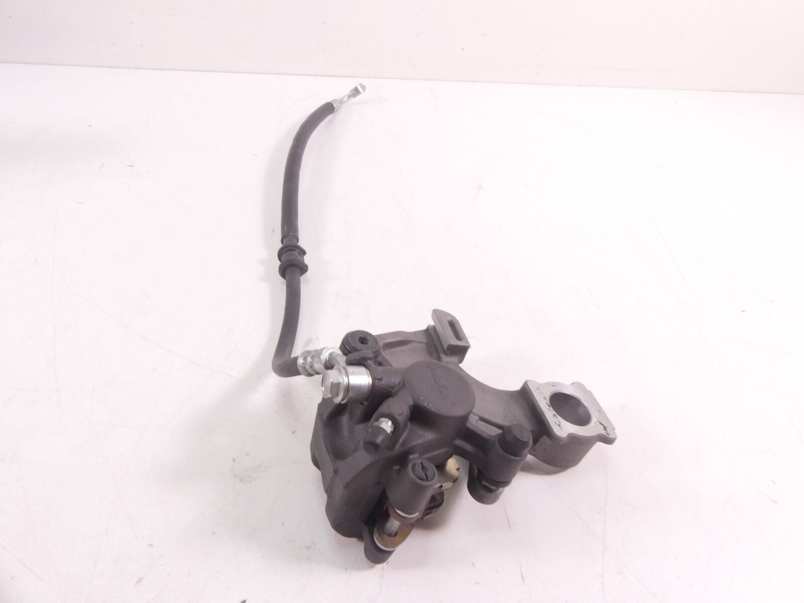 2018 Suzuki GSXR750 Rear Nissin Brake Caliper + Mount & Line 69100-47H10-999 {{ shop.shopifyCountryName }} - Mototech271