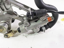 Load image into Gallery viewer, 2005 Kawasaki ZX12R Ninja Right Footpeg &amp; Brake Master Cylinder 35063-0069-458
