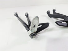 Load image into Gallery viewer, 2024 Triumph Street Triple 765 R Rear Passenger Footpeg Set T2088156 T2088157
