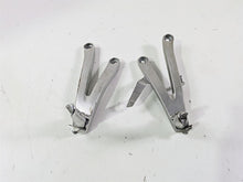Load image into Gallery viewer, 2025 Honda CBR600RR Rear Passenger Footpeg Set 50750-MFJ-D00 50760-MFJ-D00
