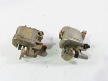 Load image into Gallery viewer, 2011 Can-Am Outlander 650 4X4 XT Front Brake Caliper Set 705600576 705600575
