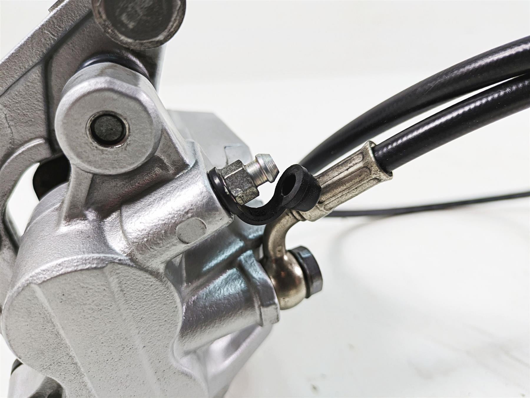 2011 Triumph America Nissin Front Brake Caliper + Line T2023203 {{ shop.shopifyCountryName }} - Mototech271