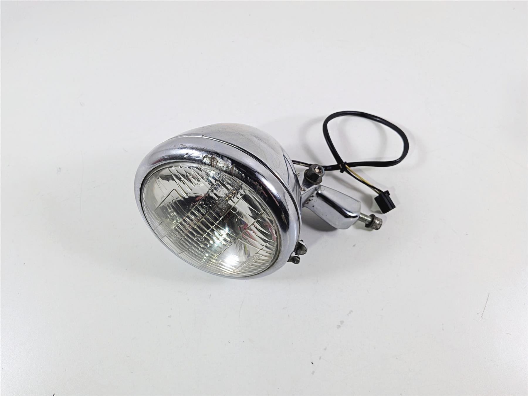 2006 Harley Sportster XL1200 C Headlight Head Light Lamp & Mount 69670-04A {{ shop.shopifyCountryName }} - Mototech271