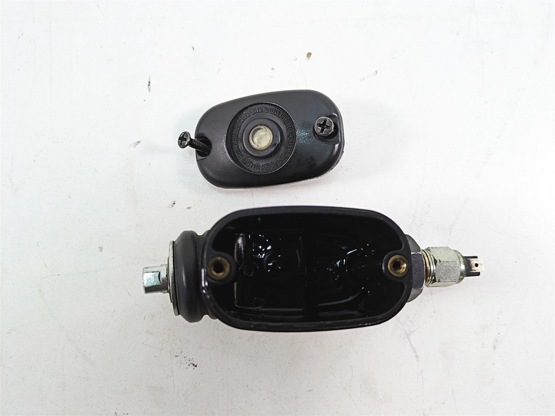 2012 Harley FLD Dyna Switchback Rear Brake Master Cylinder 42474-06C {{ shop.shopifyCountryName }} - Mototech271