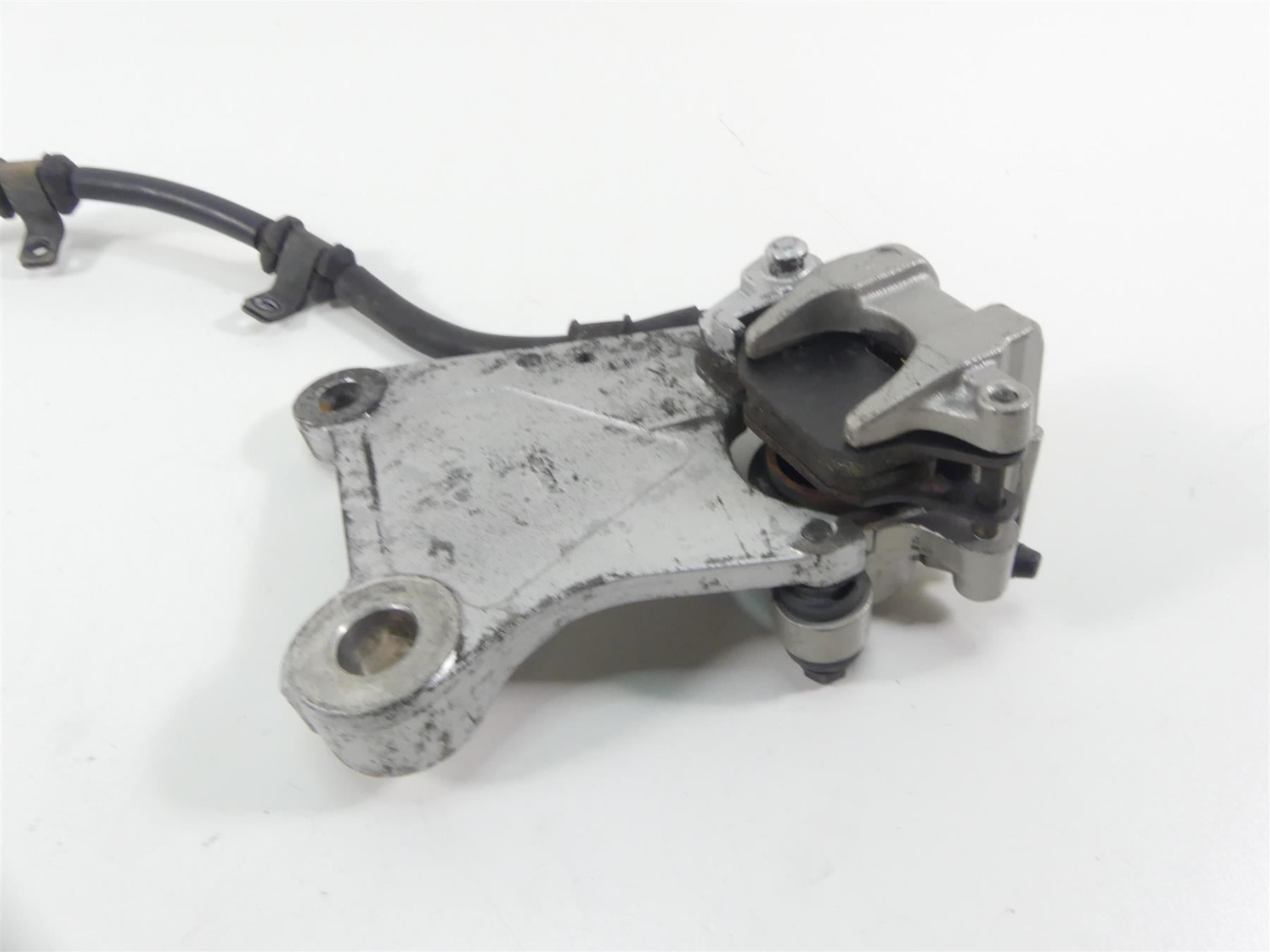 2003 Honda VTX1300 S Rear Nissin Brake Caliper + Bracket & Line 43150-MEA-671 {{ shop.shopifyCountryName }} - Mototech271