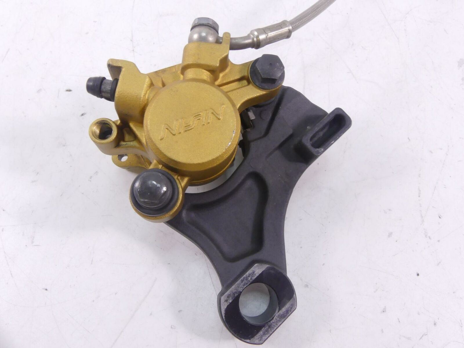 2009 Triumph Street Triple 675R Rear Nissin Brake Caliper + Mount T2307352 {{ shop.shopifyCountryName }} - Mototech271