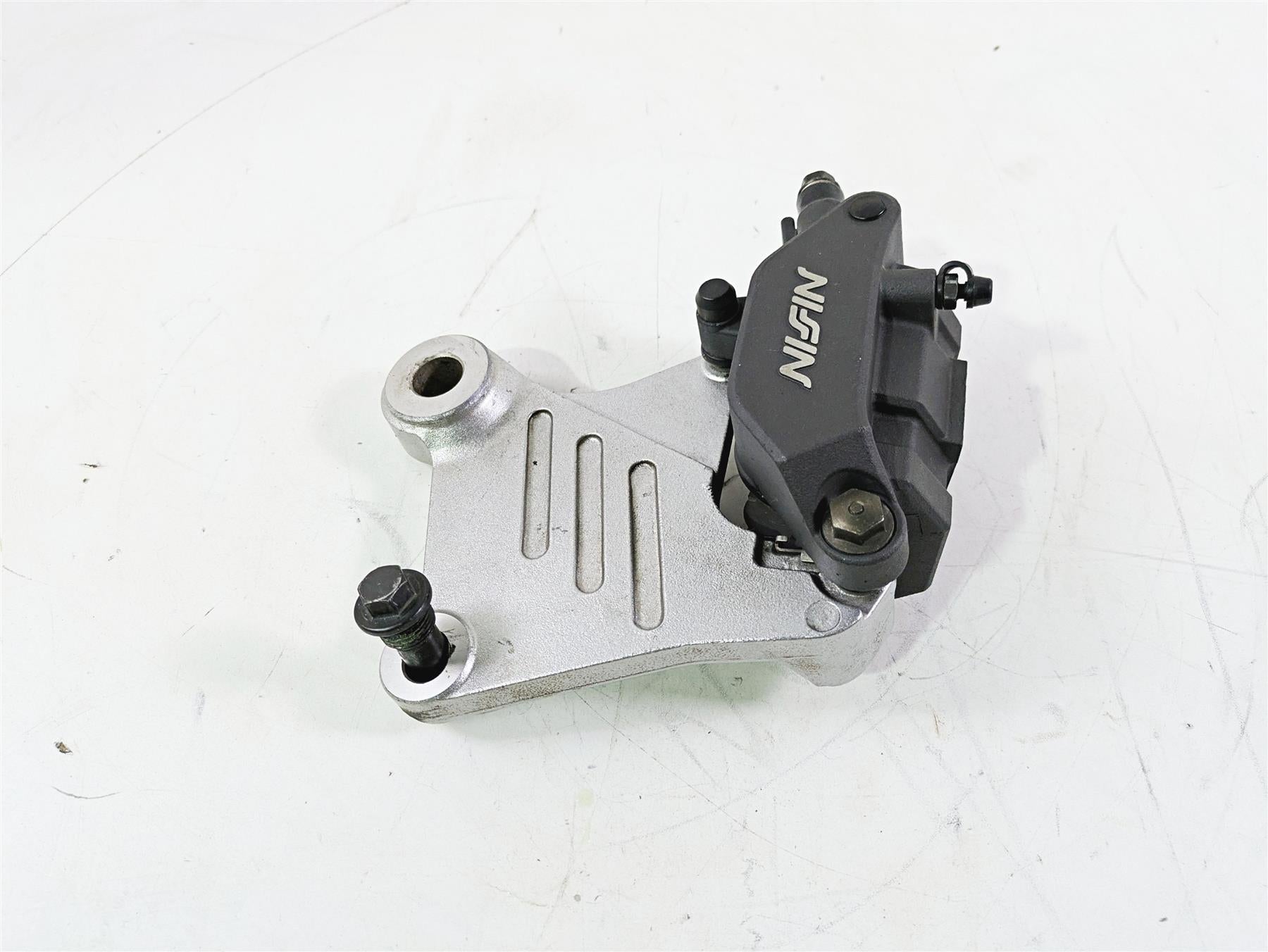 2002 Honda V-Twin VTX1800 C Rear Brake Caliper & Bracket Nissin 43150-MCH-006 {{ shop.shopifyCountryName }} - Mototech271