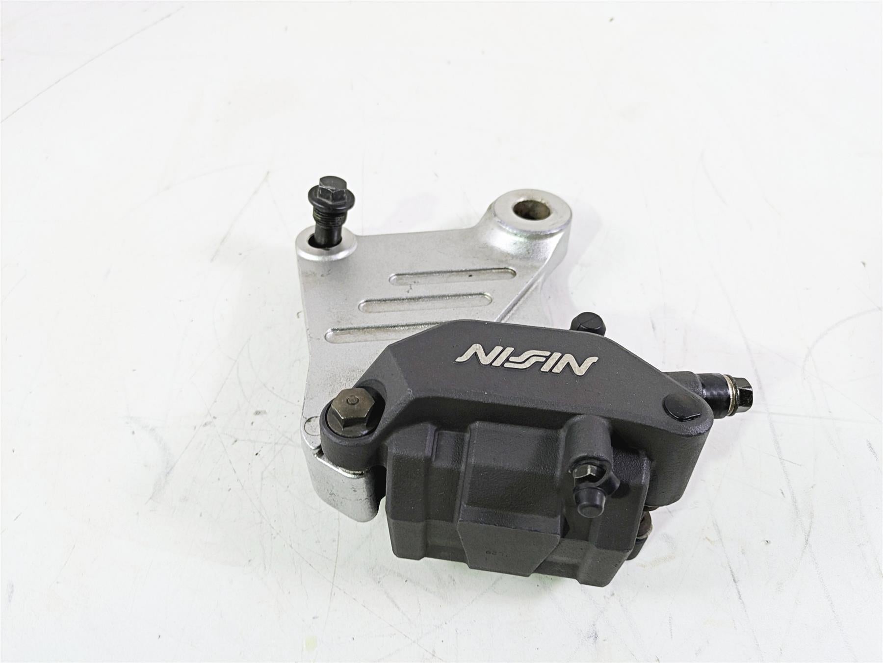 2002 Honda V-Twin VTX1800 C Rear Brake Caliper & Bracket Nissin 43150-MCH-006 {{ shop.shopifyCountryName }} - Mototech271