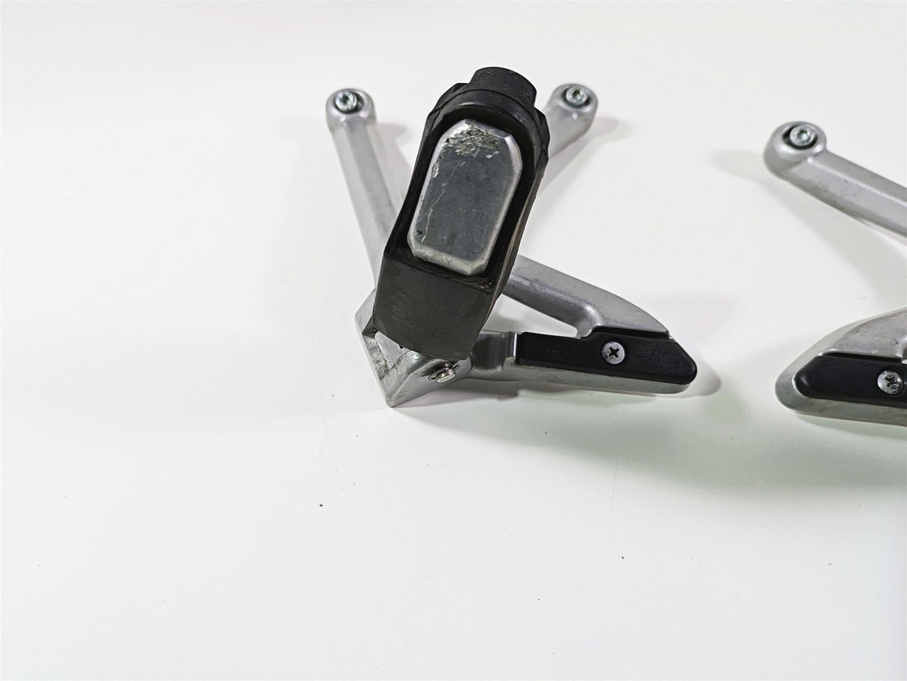 2015 Triumph Tiger Explorer XC Rear Passenger Footpeg Rest Set T2082161 T2082162 {{ shop.shopifyCountryName }} - Mototech271