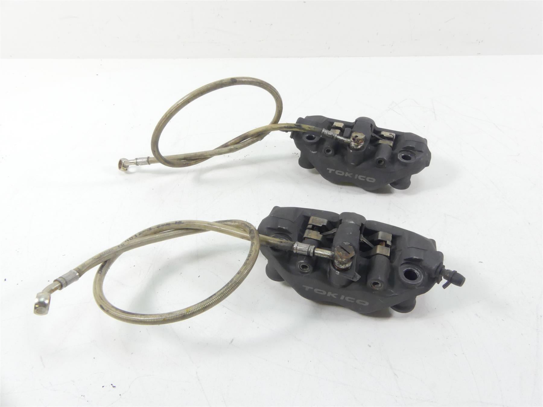 2004 Honda CBR1000RR SC57 Front Tokico Brake Caliper Set 45250-MEL-023 {{ shop.shopifyCountryName }} - Mototech271