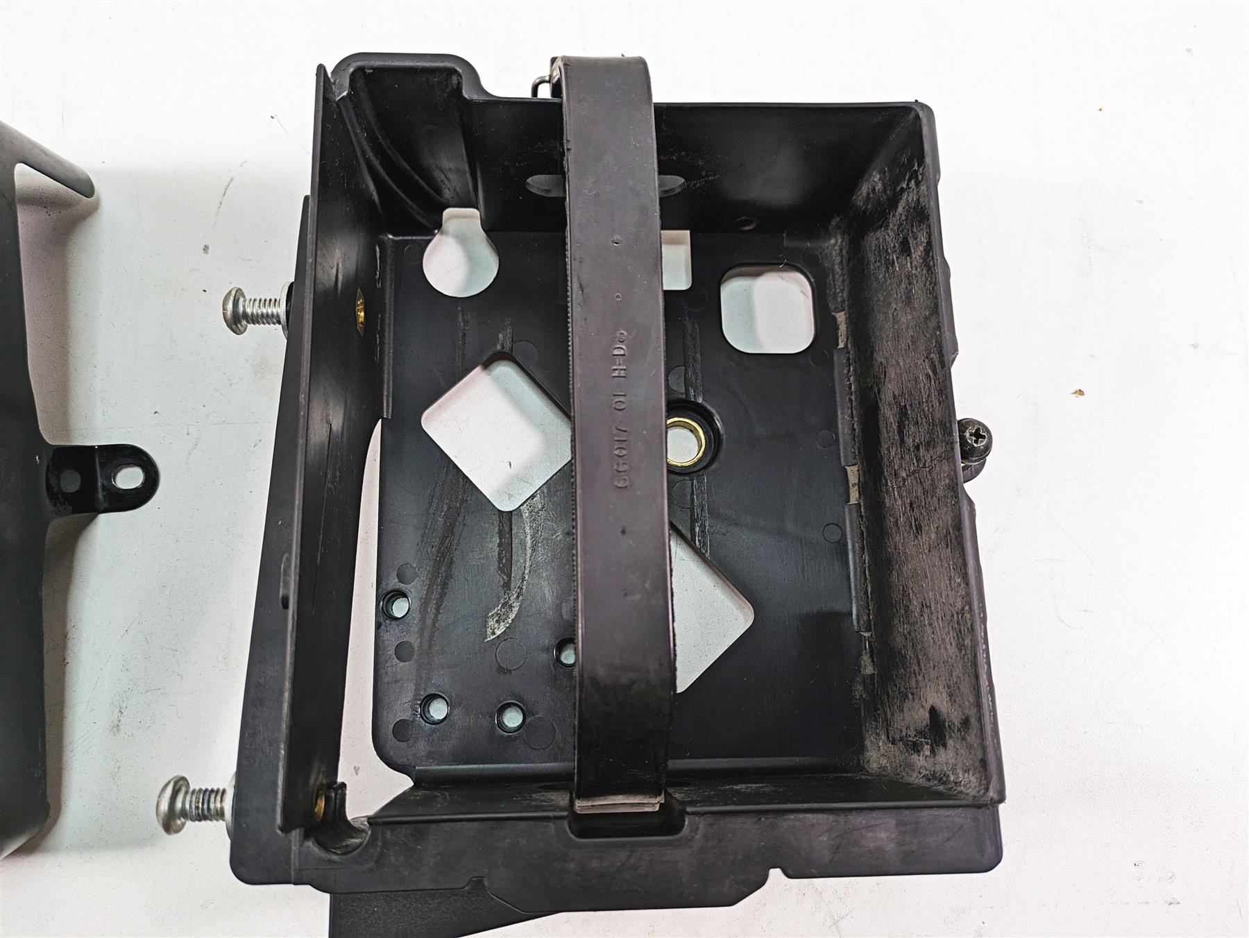 2012 Harley FLD Dyna Switchback Battery Tray Carrier Stay & Cover 70379-06B {{ shop.shopifyCountryName }} - Mototech271