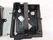 Load image into Gallery viewer, 2012 Harley FLD Dyna Switchback Battery Tray Carrier Stay &amp; Cover 70379-06B | Mototech271
