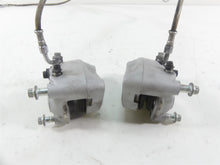 Load image into Gallery viewer, 2007 Harley Touring FLHR SE CVO Road King Front Brake Caliper Set 44381-99C
