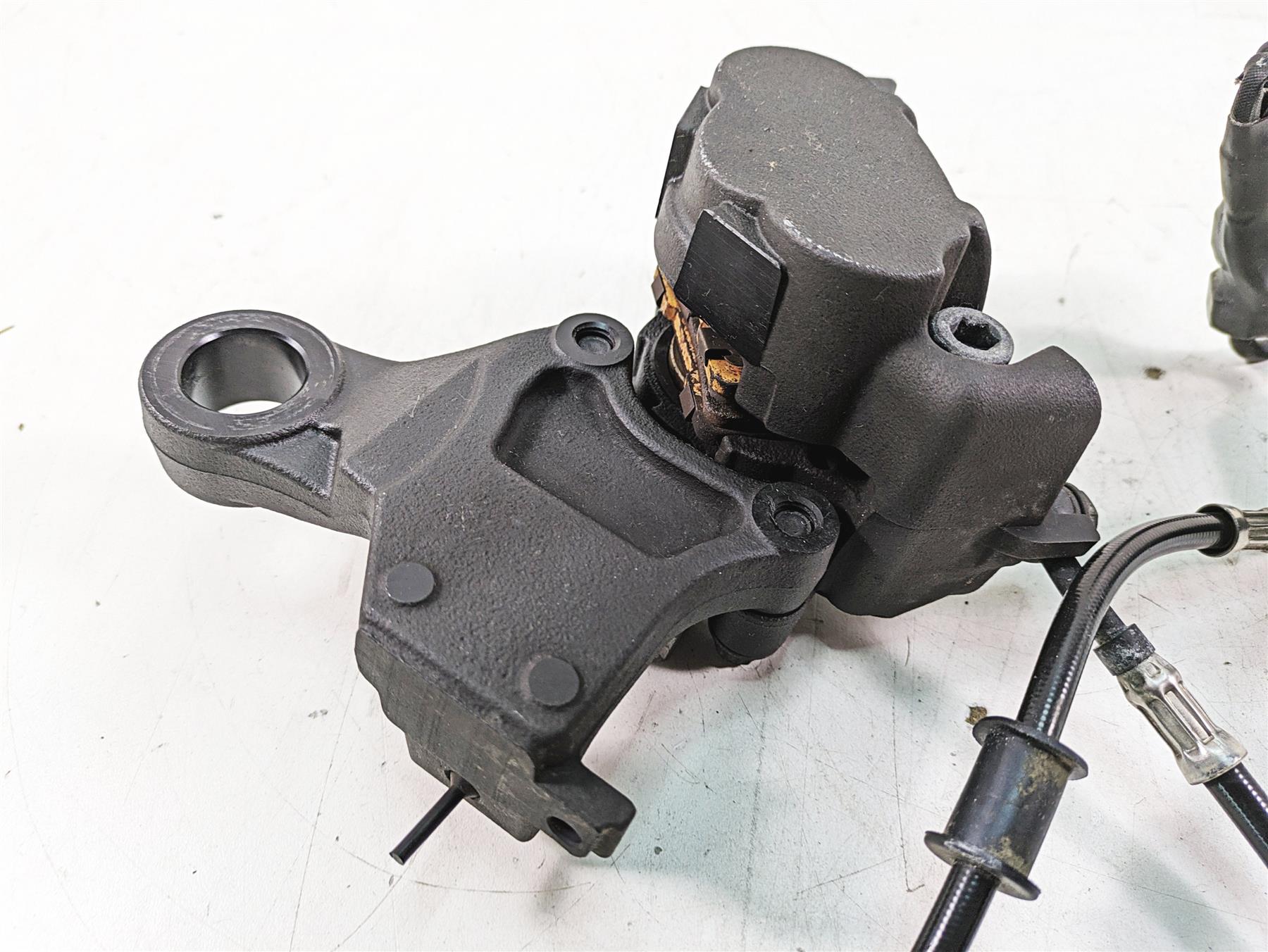 2019 Harley XL883N Sportster Iron Rear Brake Caliper & Bracket, Line 41300039 {{ shop.shopifyCountryName }} - Mototech271