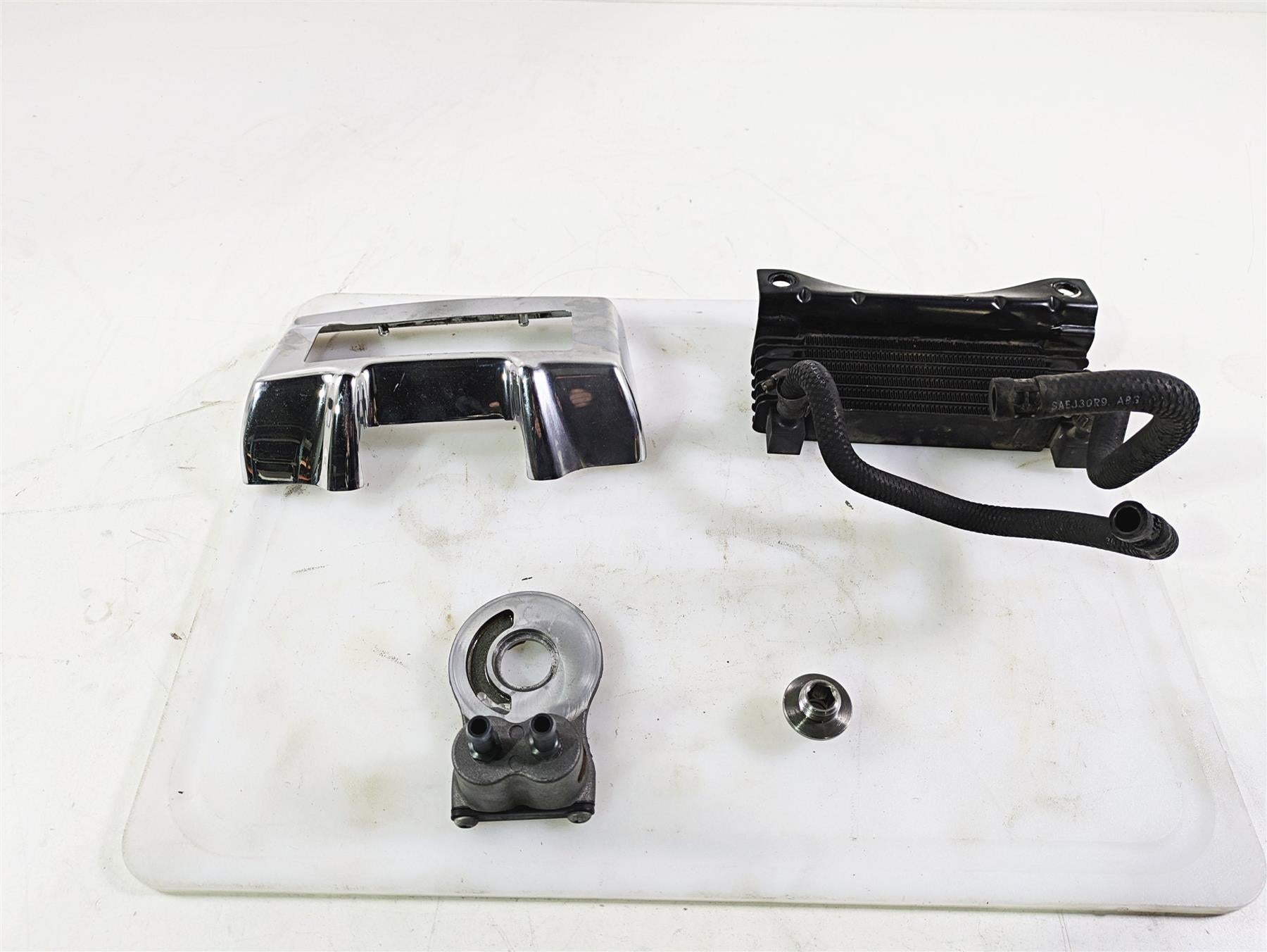 2011 Harley Touring FLHTCUSE CVO E-Glide Oil Cooler Flange Cover Lines 63083-11A | Mototech271