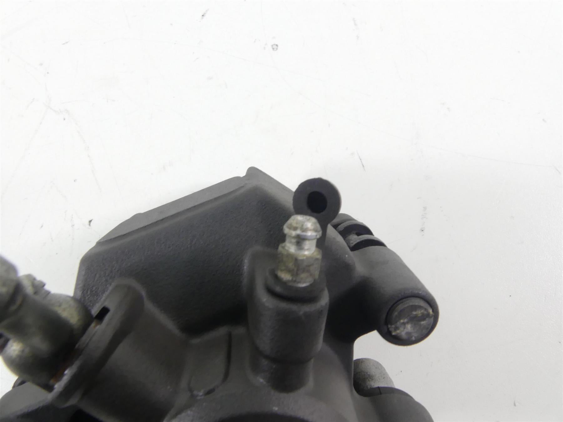 2007 Buell XB12 SS Lightning Rear Nissin Brake Caliper & Bracket H0102.02A8A {{ shop.shopifyCountryName }} - Mototech271