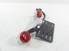 Load image into Gallery viewer, 2013 Harley Touring FLHX Street Glide Rear Turn Signal Plate Holder Set 73314-10 | Mototech271

