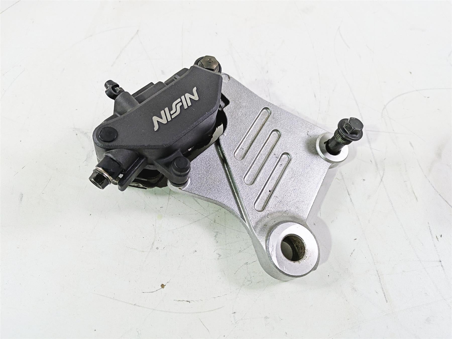 2002 Honda V-Twin VTX1800 C Rear Brake Caliper & Bracket Nissin 43150-MCH-006 {{ shop.shopifyCountryName }} - Mototech271
