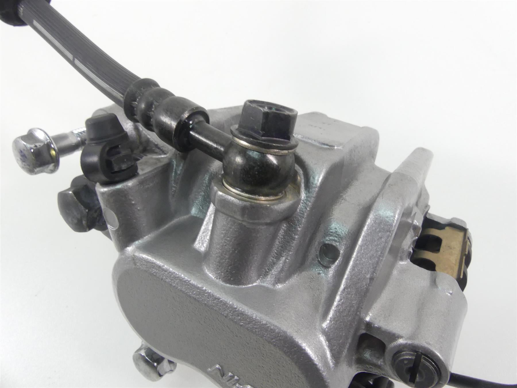 2007 Honda VT1100 C2 Shadow Nissin Front Brake Caliper + Line 45150-MAH-315 {{ shop.shopifyCountryName }} - Mototech271