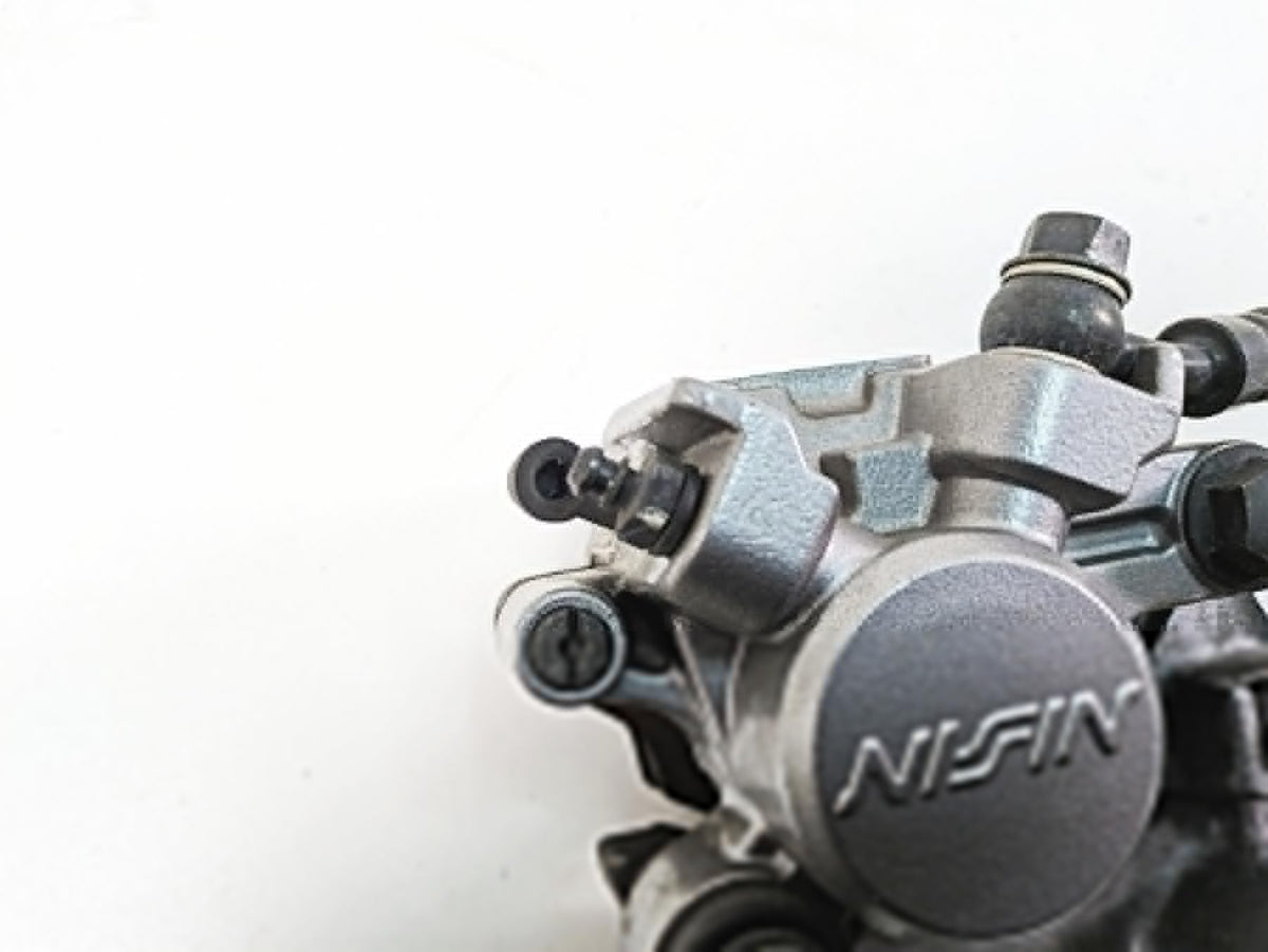 2006 Honda VT1100 C2 Shadow Nissin Rear Brake Caliper & Bracket 43150-MAH-315 {{ shop.shopifyCountryName }} - Mototech271