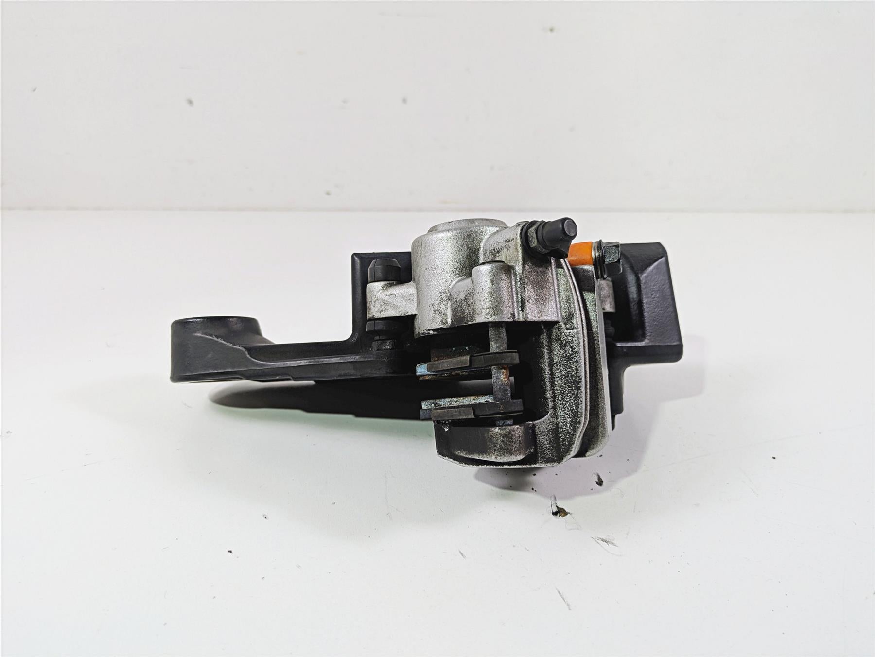2007 Harley Sportster XL1200 C Rear Brake Caliper & Mount 42029-07 {{ shop.shopifyCountryName }} - Mototech271
