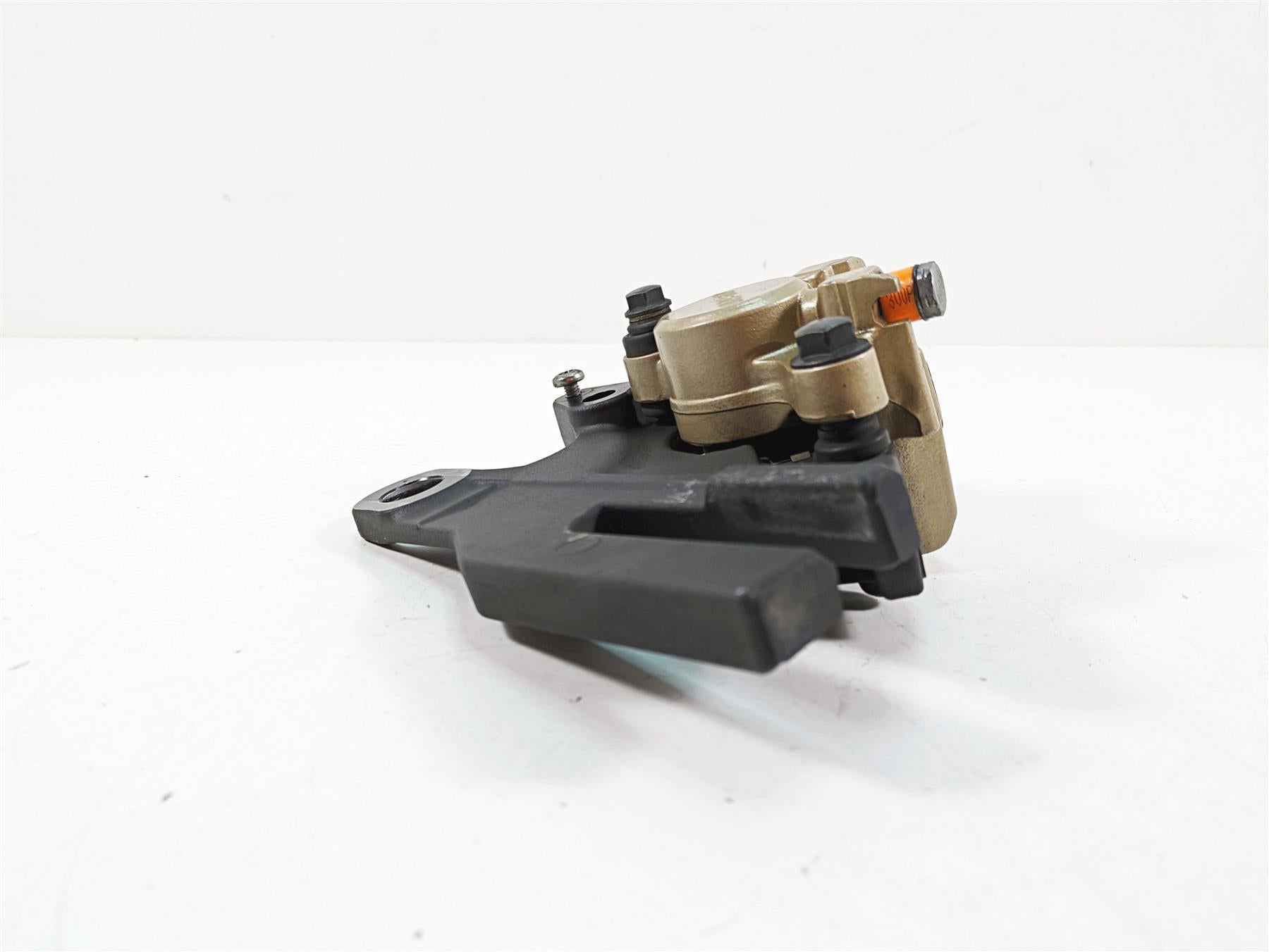 2012 Triumph Tiger 800XC ABS Rear Nissin Brake Caliper & Bracket T2025050 {{ shop.shopifyCountryName }} - Mototech271