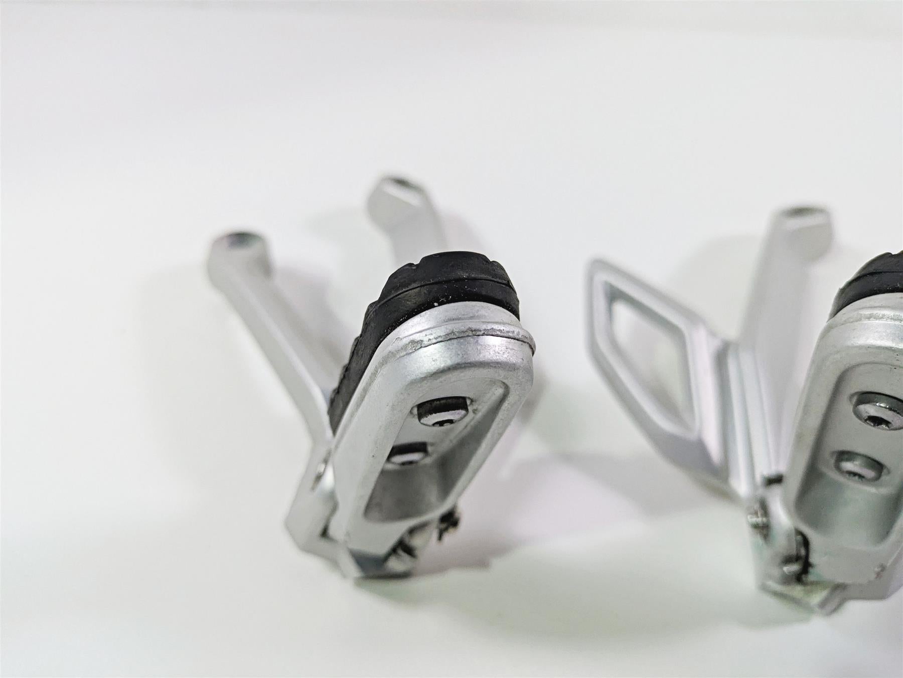 2024 Triumph Tiger 900 GT Rear Passenger Footpeg Rest Set T2082284 T2082359 {{ shop.shopifyCountryName }} - Mototech271