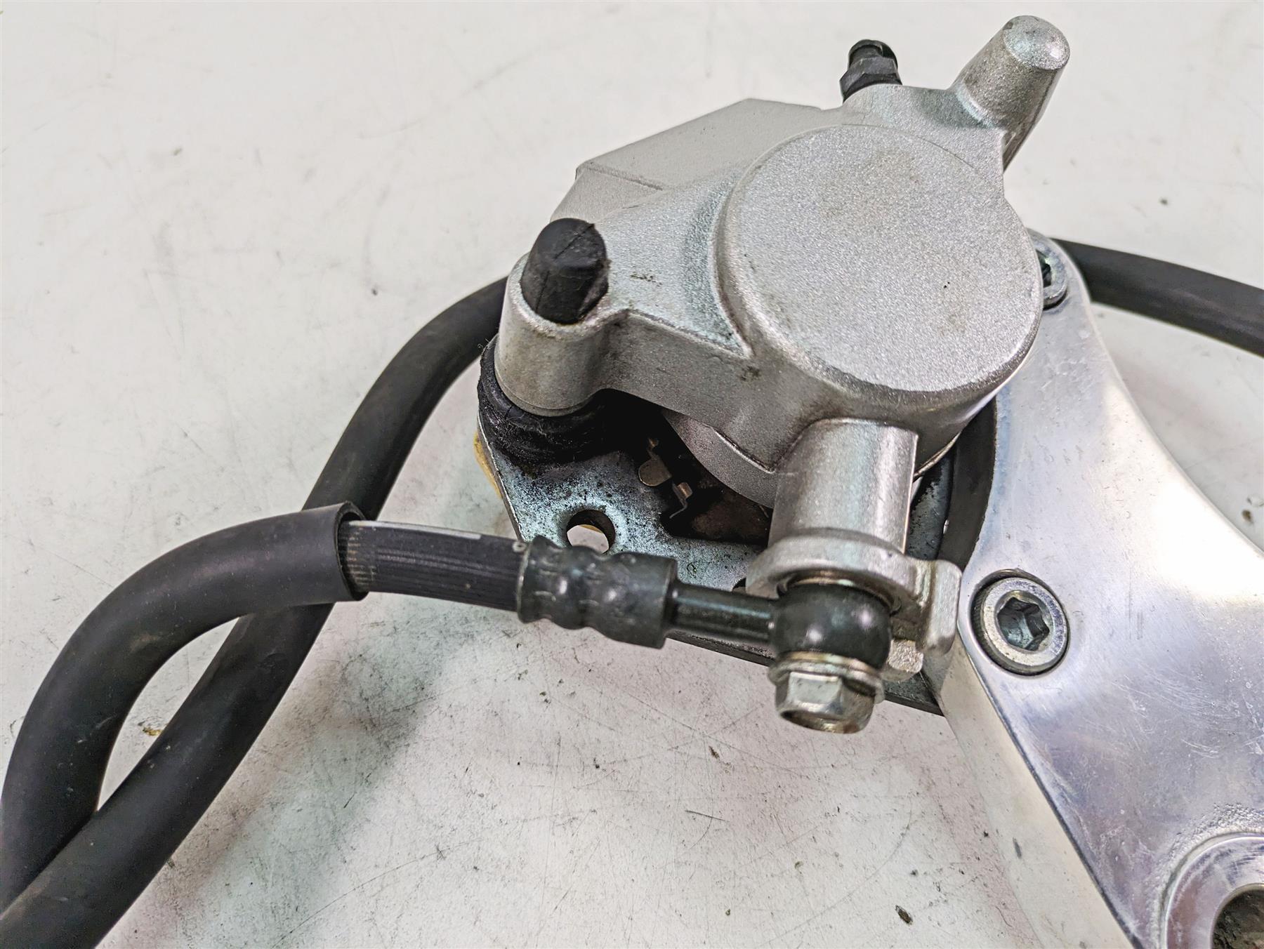 1997 Kawasaki VN1500 Vulcan Tokico Rear Brake Caliper & Bracket 43041-1588-GN {{ shop.shopifyCountryName }} - Mototech271