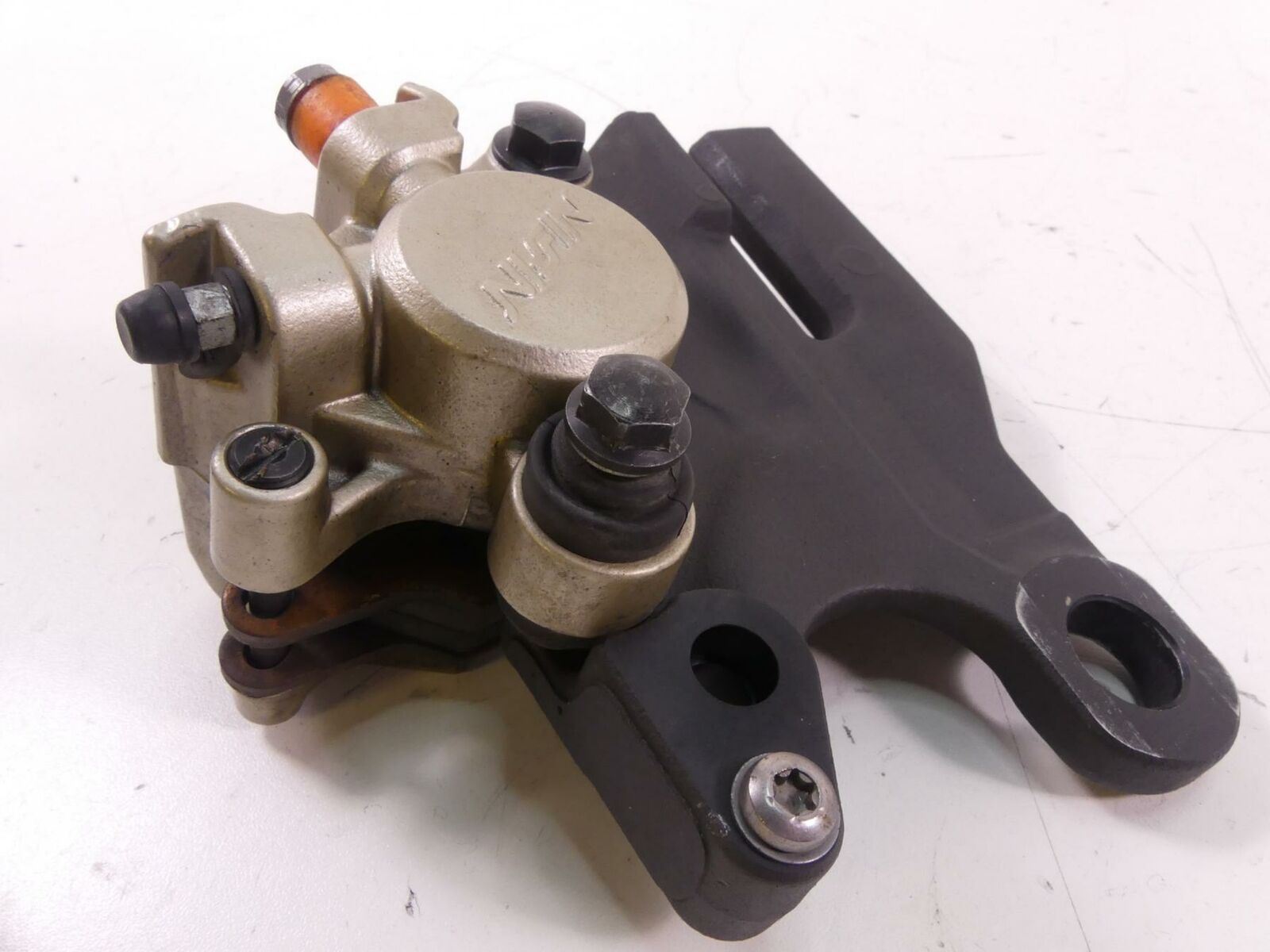 2014 Triumph Tiger 800 ABS Rear Nissin Brake Caliper With Bracket T2025050 {{ shop.shopifyCountryName }} - Mototech271